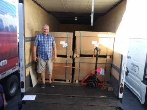 Atlantic Expedited driver Victor with secured freight in a loaded trailer